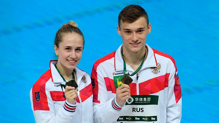 Шлейхер и Тимошинина завоевали золото в синхронных прыжках в воду на ЧЕ - фото