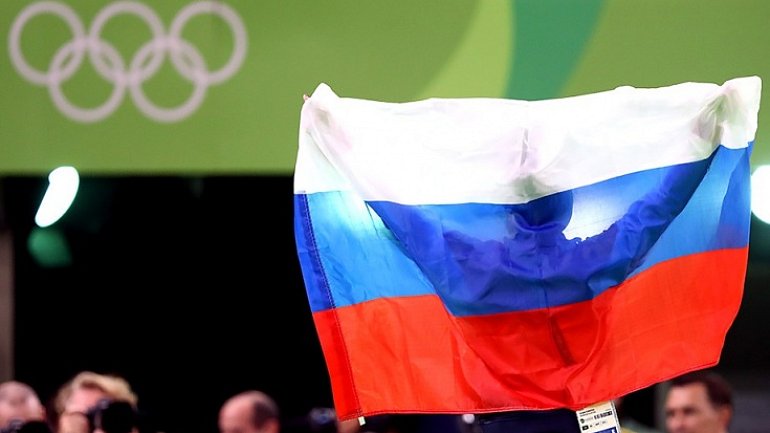 МОК назвал критерии снятия запрета на флаг России на церемонии закрытия Олимпиалы-2018 - фото