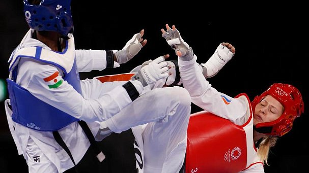 Минина выиграла серебряную медаль на Олимпиаде в Токио - фото
