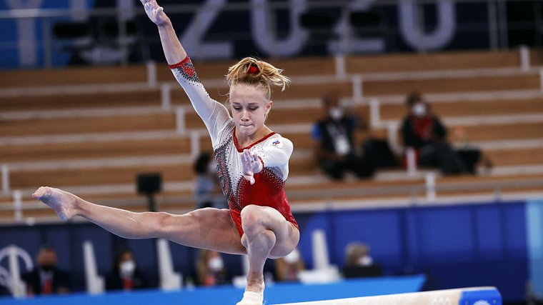 Женская сборная России по гимнастике завоевала первое в своей истории золото Олимпийских игр в командном многоборье  - фото