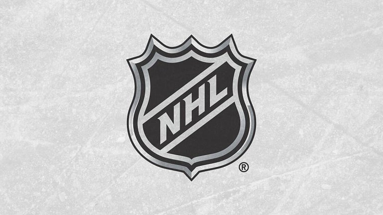 НХЛ приостановила отношения с российскими партнерами  - фото