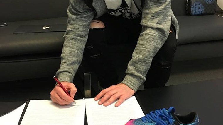 Лионель Месси подписал новый контракт с adidas - фото
