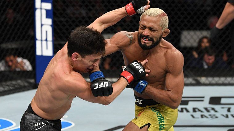 Бразилец Фигередо избил американца и стал чемпионом UFC - фото