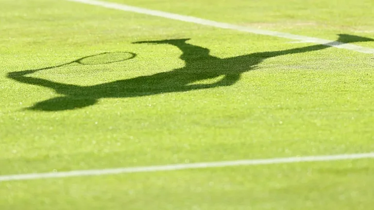 Федерер начал с победы на Уимблдоне - фото